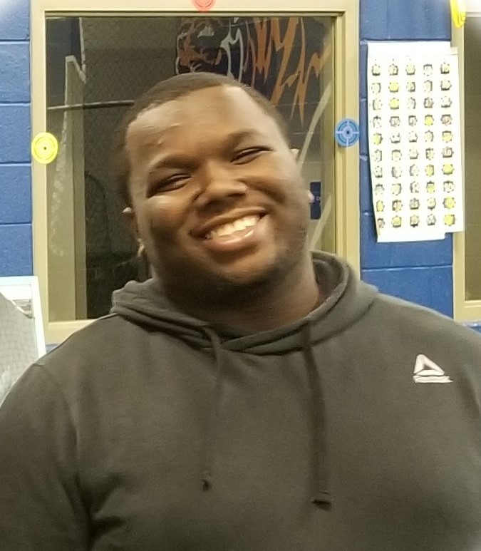 Otis White Otis, a young Black man who is a University of Memphis TigerLIFE grad; he is shown smiling and wearing a hoodie.