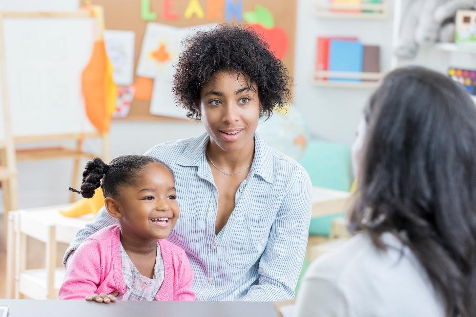 Parent with Child Care Provider Parent at Child Care Center