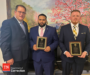 Photo (L to R): Warden James Holloway, Ruben Estevez & Tyler Briggs Photo (L to R): Warden James Holloway, Ruben Estevez & Tyler Briggs