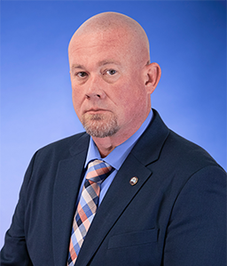 Blue Background Photos - 69 Photo of Warden Brandon Watwood