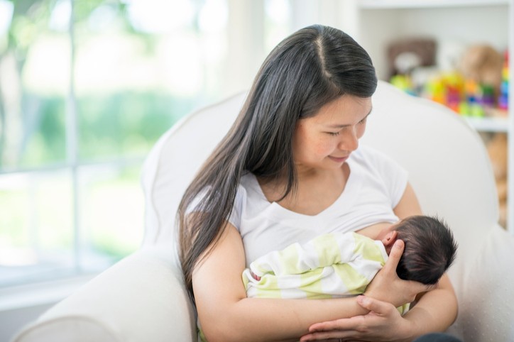 breastfeeding mom in chair