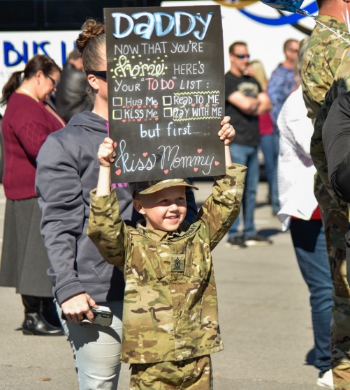 Families, friends and fellow service members gathered to greet Tennessee National Guardsmen as they return home from a year-long deployment, Oct. 27, at Smyrna’s Volunteer Training Site. Members of the 913th Engineer Company, 269th Military Police Company, and C Company, 2nd Battalion, 151st Aviation Regiment were deployed supporting operations near Laredo, Texas. (Photo by U.S. Army Sgt. 1st Class Timothy Cordeiro)