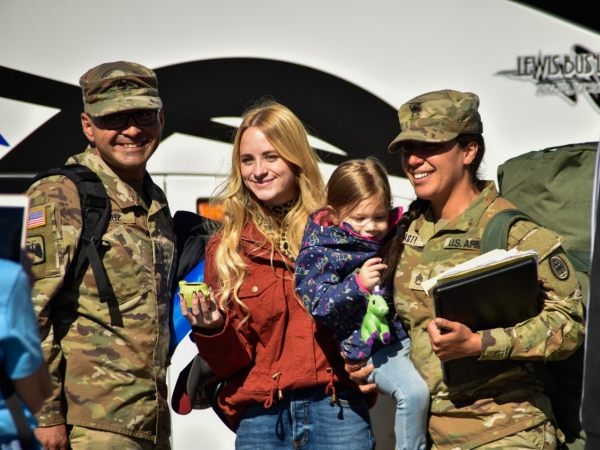 Families, friends and fellow service members gathered to greet Tennessee National Guardsmen as they return home from a year-long deployment, Oct. 27, at Smyrna’s Volunteer Training Site. Members of the 913th Engineer Company, 269th Military Police Company, and C Company, 2nd Battalion, 151st Aviation Regiment were deployed supporting operations near Laredo, Texas. (Photo by U.S. Army Sgt. 1st Class Timothy Cordeiro)