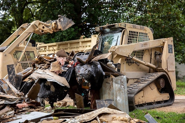Soldiers from the 230th Engineer Battalion remove debris in Waverly, September 9th. More than 17 inches of rain caused flash floods that ravaged the Waverly community August 20th -21st.. (Photo by Staff Sgt. Timothy Cordeiro) Soldiers from the 230th Engineer Battalion remove debris in Waverly, September 9th. More than 17 inches of rain caused flash floods that ravaged the Waverly community August 20th -21st.. (Photo by Staff Sgt. Timothy Cordeiro)
