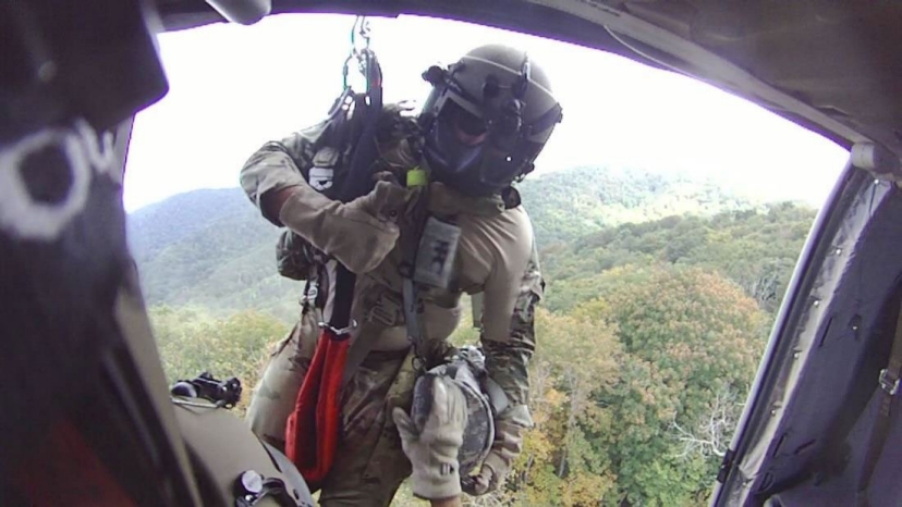 Sgt. 1st Class Giovanni DeZuani, a flight paramedic, is lowered from a UH-60 Blackhawk near Derrick Knob Shelter to rescue a hiker in distress along the Appalachian Trail, Sept. 20. The flight crew from the Tennessee National Guard conducted the emergency air evacuation mission after a hiker reported chest pains. (Courtesy photo from the Tennessee National Guard) Sgt. 1st Class Giovanni DeZuani, a flight paramedic, is lowered from a UH-60 Blackhawk near Derrick Knob Shelter to rescue a hiker in distress along the Appalachian Trail, Sept. 20. The flight crew from the Tennessee National Guard conducted the emergency air evacuation mission after a hiker reported chest pains. (Courtesy photo from the Tennessee National Guard)
