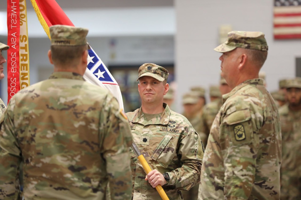 Lt. Col. Tony Glandorf, the new commander of the 194th Engineer Brigade, prepares to present the brigade colors to Command Sgt. Maj. Michael Plemons, during the 194th’s change of command ceremony at Smyrna’s Volunteer Training Site on Friday, June 7. (photo by Capt. Kealy Moriarty) Lt. Col. Tony Glandorf, the new commander of the 194th Engineer Brigade, prepares to present the brigade colors to Command Sgt. Maj. Michael Plemons, during the 194th’s change of command ceremony at Smyrna’s Volunteer Training Site on Friday, June 7. (photo by Capt. Kealy Moriarty)