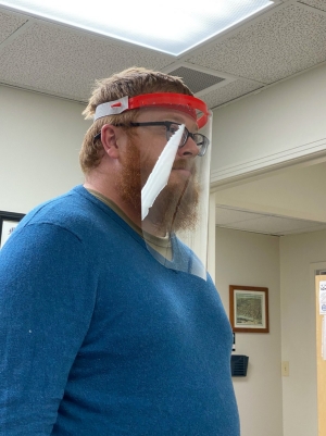Person wearing face shield