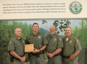 TWRA Wildlife Officer Hunter Daniels Hunter Daniels holds his award for being named Mississippi Flyway Waterfowl Enforcement Officer of the Year. He is flanked by Region I Major Brian Elkins (left) and Col. Darren Rider, and Region II Major Jeff Skelton.